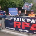 A new pay deal struck for Royal Fleet Auxiliary sailors has been hailed as a success, but more work needs to be done to improve the force. Pictured: Royal Fleet Auxiliary staff, who are members of the Nautilus International Union, staged a demonstration near the military base on Whale Island.