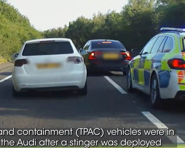 Dramatic footage shows reckless Audi driver get boxed in by police