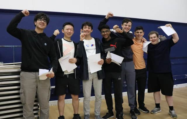 A group of friends are happy with the outcome of their hard work at The Portsmouth Academy