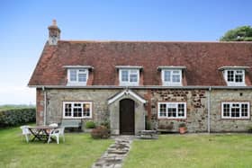 The listing says: "This truly stunning 4 bedroom detached character cottage which is nestled on the outskirts of rural Chale is an ideal family home."