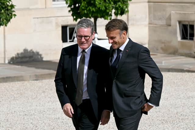 Prime Minister Sir Keir Starmer is greeted by Emmanuel Macron, President of France, as he arrives at the Elysee presidential palace for a meeting in Paris. He addressed potential legislation which would introduce tighter smoking restrictions. Picture: Justin Tallis/PA Wire