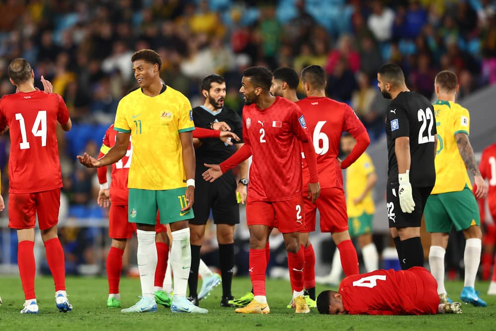 Pompey's Kusini Yengi is sent off for Australia against Bahrain today. Pic: Getty.