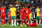 Pompey's Kusini Yengi is sent off for Australia against Bahrain today. Pic: Getty.