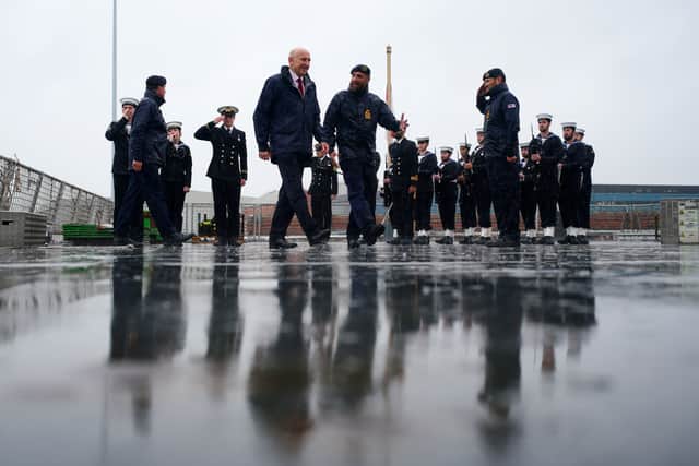 Defence Secretary John Healey stepping aboard HMS Diamond during a visit to HM Naval Base Portsmouth.