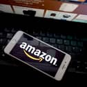 Amazon app seen on a mobile phone. Photo by Edward Smith/Getty Images