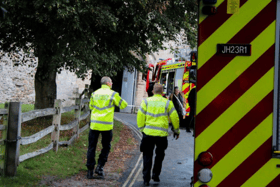 A man fell off a bridge and into a 15ft moat at Portchester Castle, with firefighters and paramedics rushing to the scene.