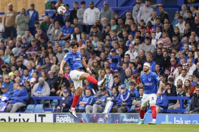 Tom McIntyre heads clear in the second half of Pompey's defeat to West Brom. Picture: Jason Brown/ProSportsImages