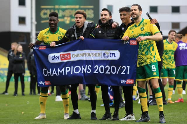 Josh Martin (second left) celebrates the Championship title with Norwich in 2020-21. Picture: Stephen Pond/Getty Images