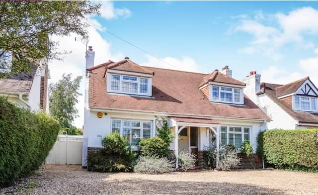This property listing says: "A 3/4 double bedroom detached house situated on a good size plot just south of Chichester city centre."