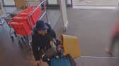 Footage of Tanya Liddle using a hat as disguise in one of her shoplifting ploys