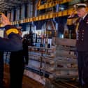 King Charles III saluting Commander Officer James Collie as he boards the Vanguard-class submarine during a visit to the Royal Naval Armaments Depot, Coulport, part of HM Naval Base Clyde. Picture date: Thursday September 19, 2024.