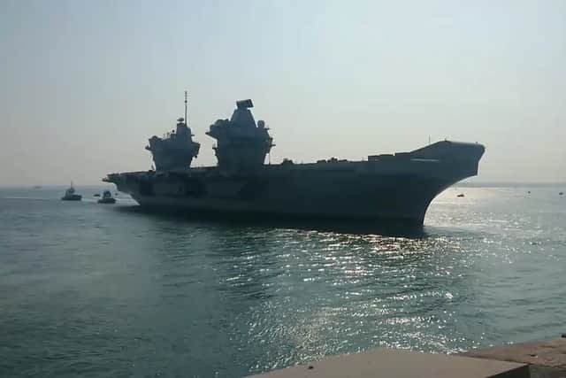 HMS Prince of Wales makes her return to Portsmouth after Operational Sea Training in the glorious sunshine.