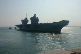 HMS Prince of Wales makes her return to Portsmouth after Operational Sea Training in the glorious sunshine.