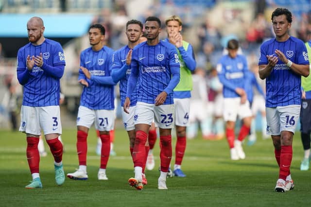 Pompey's players are forlorn after the final whistle of their late defeat at Burnley. Picture: Jason Brown/ProSportsImages