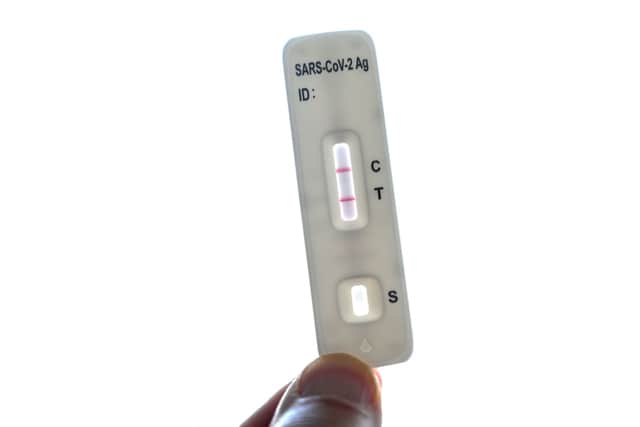A positive Covid test, showing two red lines appearing on both the C and T.