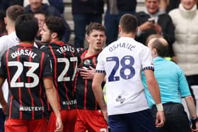 Blackburn defender Owen Beck confronts Preston's Milutin Osmajic about an alleged bite during Sunday's Championship game at Deepdale