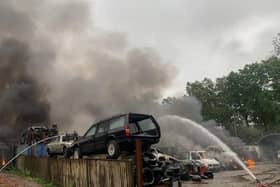 Scrapyard blaze creates large smoke plume over Aldershot.