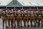 Female recruits to the armed forces have had their training stifled due to poorly fitted equipment, Ofsted has said. Pictured is a Junior Soldiers parade on the Regimental square as they graduate from the Army Foundation College on  in Harrogate, North Yorkshire.