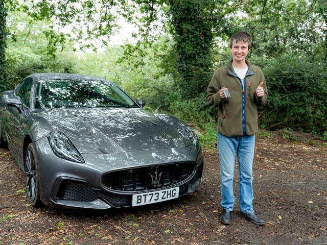 21-year-old Asda worker Jasper Hemsworth with the £160k Maserati he won in an Omaze prize draw.