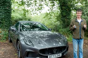 21-year-old Asda worker Jasper Hemsworth with the £160k Maserati he won in an Omaze prize draw.