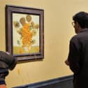 Just Stop Oil throw soup over Van Gogh's Sunflowers for second time.
