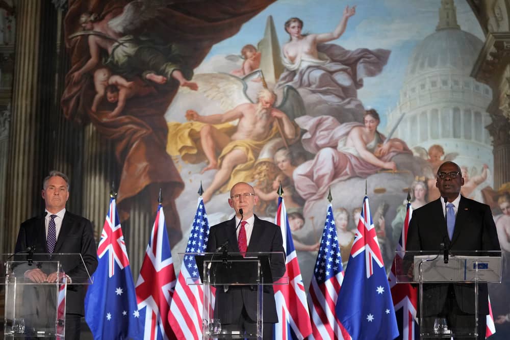 Defence Secretary John Healey (center), US Secretary of Defence Lloyd Austin (right), and Australian Defence Minister Richard Marles speak during a press conference at the AUKUS Defence Ministers Meeting at Old Royal Naval College, Greenwich, London.