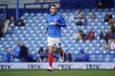 Conor Shaughnessy warms up ahead of Pompey's game against Sheffield United - before his injury blow.