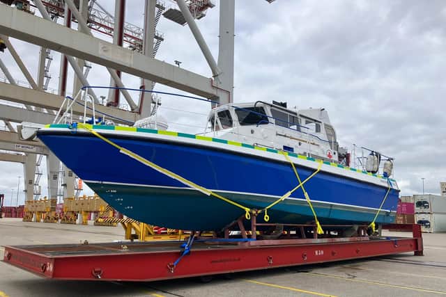 Locked and loaded: the new MV Lady Jean is prepared for her shipment to Africa. HMS Scimitar was previously used as a Royal Navy patrol boat in Gibraltar.