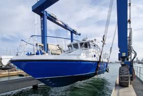 The gleaming new MV Lady Jean is lifted back into the water by the UK Docks Marine Services team ahead of her long journey from Gosport to Lake Victoria. The former HMS Scimitar, a Royal Navy patrol boat used in Gibraltar, has been converted into a medical vessel.