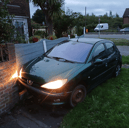 A crashed Peugeot was seen in the front garden of a house in Bedhampton. Police have charged a man with drink driving and other offences.