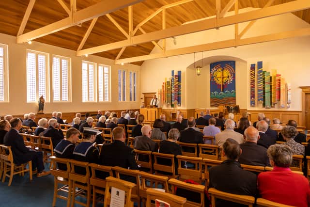 A service will be held for the 85th anniversary of HMS Royal Oak soon. Pictures is families coming together last year at a service held at the Church of St Barabara.