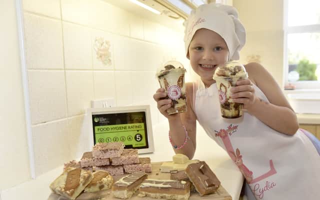 Lydia Hughes (5) from Waterlooville, has set up her own business via Facebook called Lydia's Cheesecakes after her love of cooking and baking started from a young age.
Picture: Sarah Standing (160924-1469)