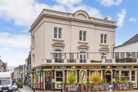 This home comes with seven bedrooms, three bathrooms and two reception rooms.