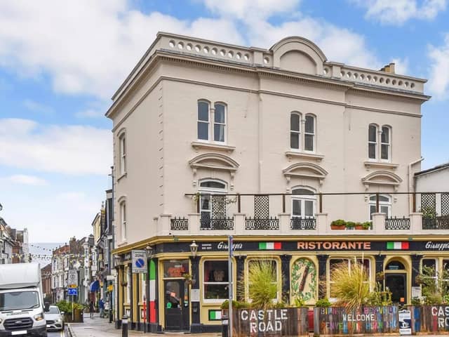 This home comes with seven bedrooms, three bathrooms and two reception rooms.