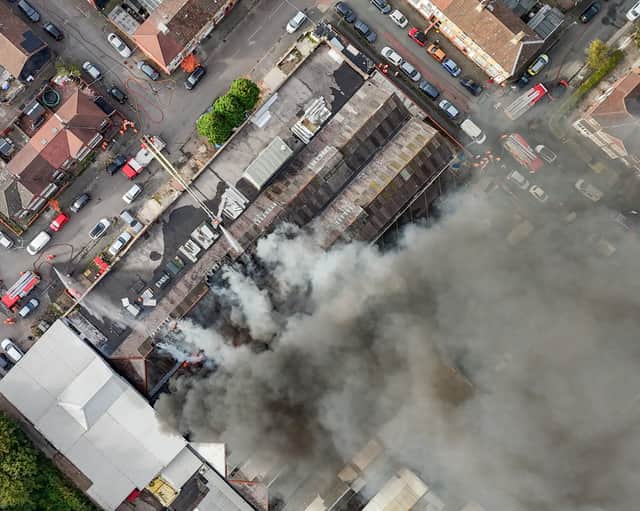 Aerial images show fire fighters tackling flames of a huge fire in Manchester