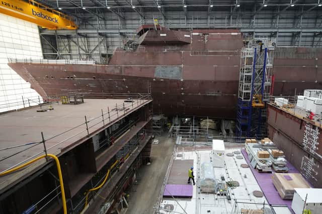 Construction work has begun on the third of five Type 31 ships HMS Formidable. Pictured is work continuing on HMS Venturer(top) and HMS Active in the Venturer building ahead of the Steel Cut ceremony for the Royal Navy's third in class Type 31 frigate, HMS Formidable, at Babcock International Group, in Rosyth.