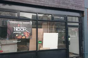 Signage has made an appearance at an empty former Indian restaurant to confirm that a new food venue will be opening soon. 