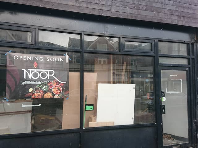 Signage has made an appearance at an empty former Indian restaurant to confirm that a new food venue will be opening soon. 