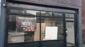 Signage has made an appearance at an empty former Indian restaurant to confirm that a new food venue will be opening soon. 