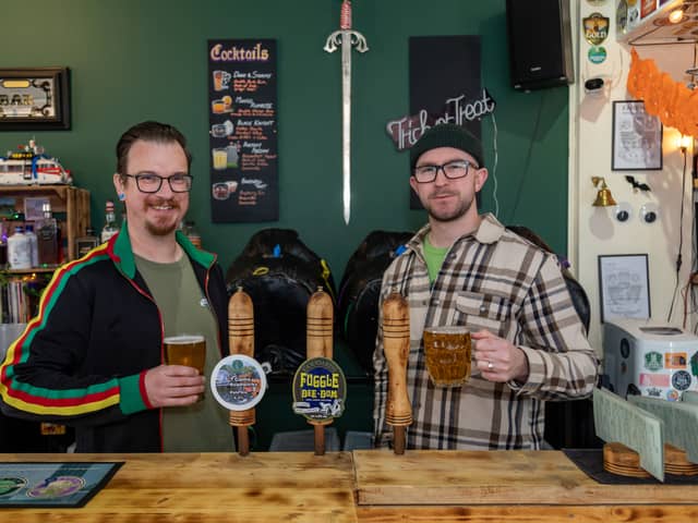 Co-owners of The Porticullis Taphouse, Phil Stenning (43) and Brewer Elliott Carrington (31), have toasted the success of their brewing operation at The Portcullis Taphouse in Portchester. Most recently, they have launched a brand new pale ale which has been named after the Cams Hill Roadworks. 
Picture: Mike Cooter (121024)