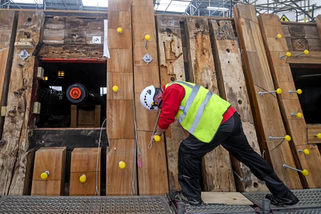 Pictured: Shipwright's work on the conservation of HMS Victory in Portsmouth Historic Dockyard.
