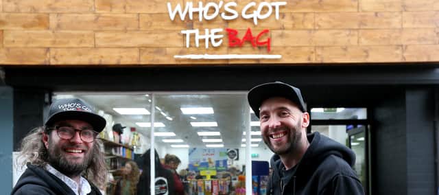 Jonathan Doidge, left, and business owner James Epps at the opening of Who's Got The Bag sweet shop in High Street, Gosport.