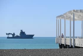 The HMNZS Manawanui, a New Zealand Royal Navy survey ship, sank after hitting a reef and running aground near Samoa, later catching fire and capsizing. Portsmouth-based patrol vessel HMS Tamar has discovered the ship's log book after patrolling near the wreckage.