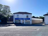 The listing says: "Located close to the centre of Emsworth, this former light commercial/office site has consent for conversion of the main building to form a residential dwelling, whilst consent is pending for the conversion of the other two outbuildings."