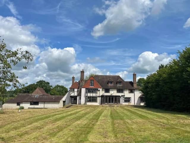 The listing says: "The property now offers the opportunity for refurbishment and repair to potentially create an impressive family house with extensive accommodation and combined with renovation of the mature grounds including potential reinstatement of the tennis court and swimming pool and enhancements of the nearby paddock and land." 