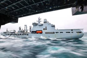 Pictured: RFA Tidespring replenishing HMS Prince of Wales. RFA Tidespring and HMS Prince of Wales conducting a RAS (Replenishment at Sea) in order to take on more fuel.
