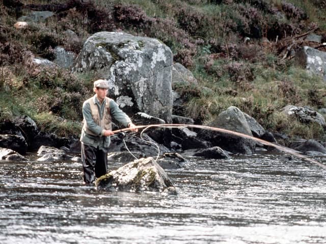 King Charles, then the Prince of Wales, enjoying fishing on the River Dee in 1982 at Balmoral, Scotland