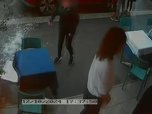 Video grab from this shocking footage shows an alleged attack on restaurant staff - in a dispute over paying a bill  at La Bella Vista in Hastings, East Sussex.