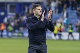 John Mousinho savours Pompey's first win of the season following a 2-1 success at QPR. Picture: Jason Brown/ProSportsImages
