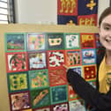 The Mary Rose Braille Word Search has been created by Portsmouth visually impaired artist, Clarke Reynolds, with help from students from Craneswater Junior School, including Eva Brinkman ,10 (pictured).
